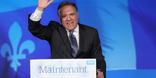 CAQ party leader Legault speaks to supporters from the podium in Quebec City