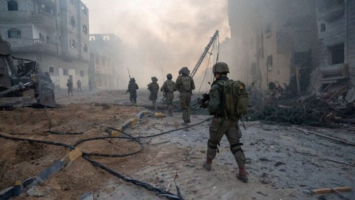 FILE PHOTO: Israeli soldiers operate in the Gaza Strip